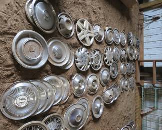 Lot 29. 45-plus old hubcaps
