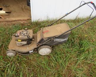 Lot 37. Craftsman lawn mower with compression