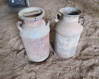 Lot 39. Two Milk cans embossed Rush City and Duluth