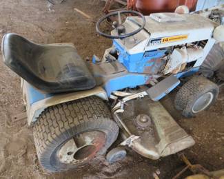 Lot 60. Ward's 14-HP hydrostatic riding lawn mower with snowblower attachment.