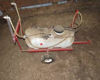 Lot 65. 14-gallon pull-behind North Star fertilizer spreader. Untested