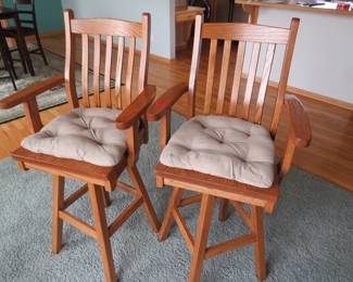 Lot 72. Two swivel oak captain's bar stools in excellent condition