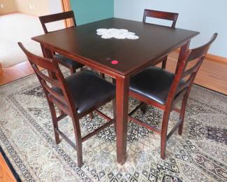 Lot 73. 36'H table and four chairs in excellent condition