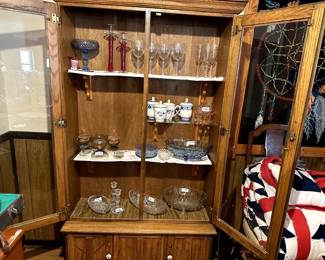 Gun cabinet converted to display cabinet with beautiful items.