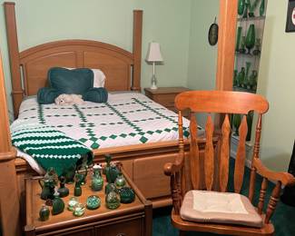 Matching queen sized poster bed with not one but two nightstands and more lovely green glass.  And this awesome rocker and side table.  
