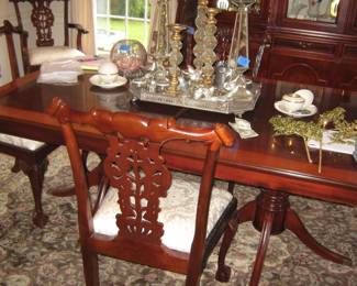 8 Chippendale Dining Chairs, and Traditional inlaid Pedestal Banquet Table with leaves