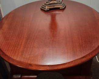 One of two cherry end lamp tables
