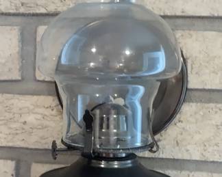 One of two oil lamps