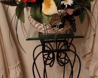 Flower Arrangements on Glass Top Side Table