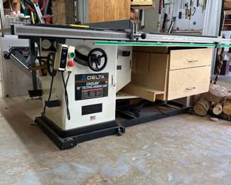 Delta 10in 3HP 230V Unisaw with Outfeed Table and Biesemeyer Fence on Rolling Base Lots of Accessories Included