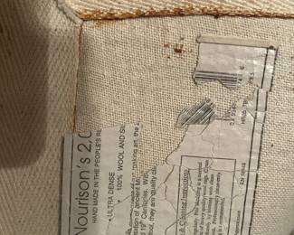 back of the rug showing the label