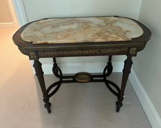 $490   Marble and carved wood based console from David  Weatherford. 40"w x 24"d x 29"h.
