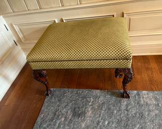 $240 Antique upholstered ottoman with carved wooded frame. 31"w x 23"d x 20"h