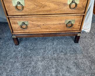 Henredon bedside table as found issue on the top given with dresser in previous photo.  Under the right side of the leg of the stand you can see a dark ring where someone got water on it under a plant or something.
