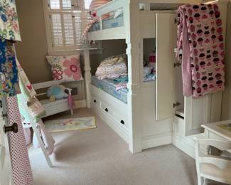 Bedding stuffies and linens sold during the in-person shopping days.  Bunks and closet are built in