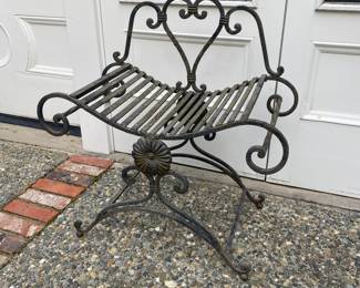 $280.   Wonderful iron chair.   28"w x 14" d x 28"h