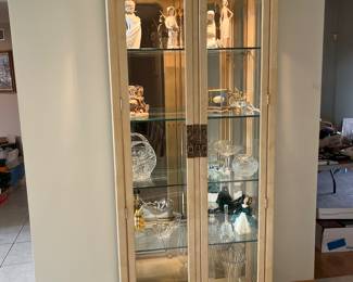 Lighted Asian inspired curio cabinet....