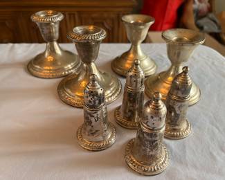 Weighted sterling silver candlesticks and salt/pepper shakers