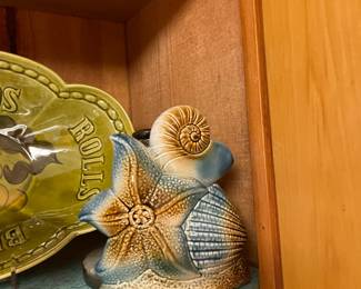 Besides the fist platter and a lantern on the patio, this was the only other “under the sea” theme item so I don’t even know where this came from.  (If your wondering it is a paper towel roll holder)