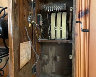 This is the insides of the crank phone - I have no idea if they’re good or bad - if everything is there or not or if it would be useable, I mean there isn’t even a number pad, so how could you dial.  But still it’s pretty cool that all that stuff is still in there.