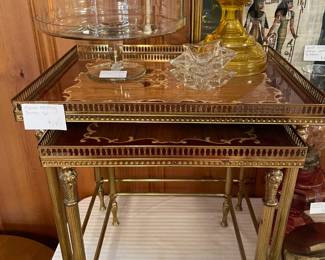 These are the fanciest tables y’all.  Solid brass legs and railing (why a table needs a railing I don’t know but it does make it feel fancy).  And the inlay in the top - like it almost feels too fancy to even put stuff on, which defeats the whole purpose of a table I suppose.