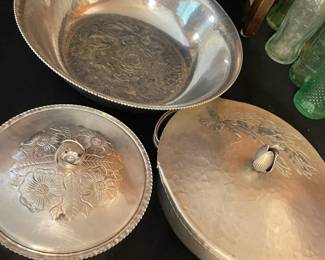 This is hammered Aluminum  - Basically when you wanted to look fancy but don’t want to bother polishing the silver (or maybe you don’t even have any silver - bless your heart) You would bring this to parties or pot lucks or church functions.