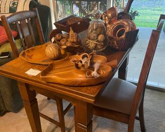This is an old game table.  Basically you can spin the top 90 degrees and then open it and you go from a 2 person table to a 4 person table. Perfect for a game of Bridge, or Cribbage, or Cannasta, or Pinochle, or Gopher ,or Whist, or Egyptian Ratscrew (One of those card games is made up and spoiler alert - it’s not Egyptian Ratscrew)