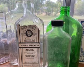 Old school glass jars - most are either liquor or extract - I hope they never got the two mixed up.  