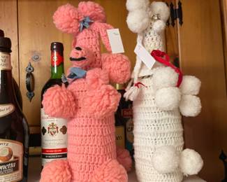 So.  Many.  Questions.  Bottle cozy - ok first why does a liquor bottle need a cozy?  It’s not gonna keep it warm or cool.  Secondly - Poodles. Why?  Who looked at that pattern and was like O.M.G I need to make these!  Oy, with the poodles already - you know.