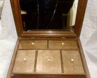 Antique men’s box with several compartments and hinged top and mirror to adjust for shaving