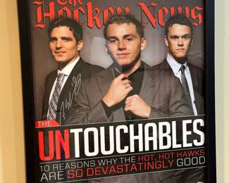 Framed Patrick Kane, Jonathan Toews, and Patrick Sharp Wall Art. Signed by Patrick Sharp.