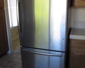 Whirlpool stainless steel (with black sides) refrigerator