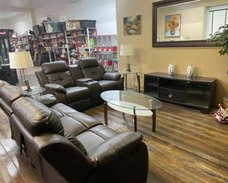 5000 square foot indoor sale.  Trio of Beautiful glass living room tables.  Modern entertainment stand