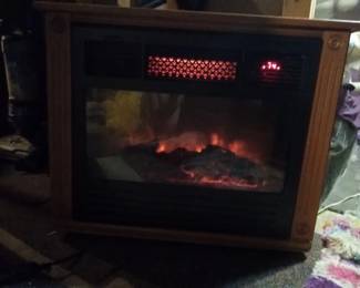 small electric fireplace/ heater on wheels - $50