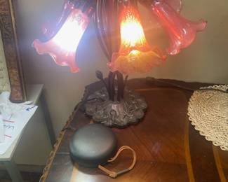 beautiful flower shaped red mercury glass desk lamp - and look at that beautiful Heckman wood inlay desk it is sitting on.  