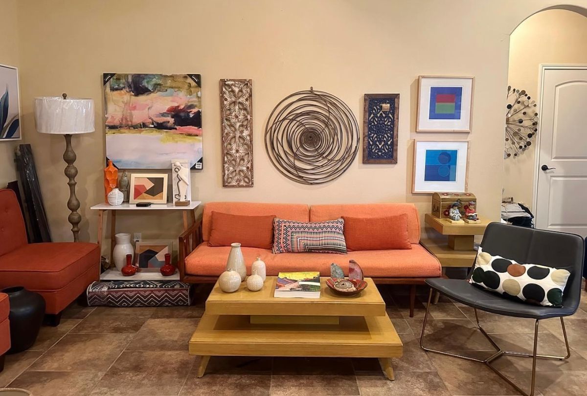 Mid century modern day bed, end table and coffee table. New orange upholstered chairs 