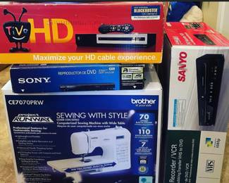 LOt's of  new sewing machines  plus new in the box electronics