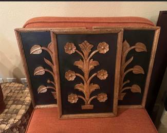 set of three carved wood plaques