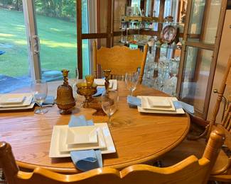 Oak pedestal dining table and pressback chairs