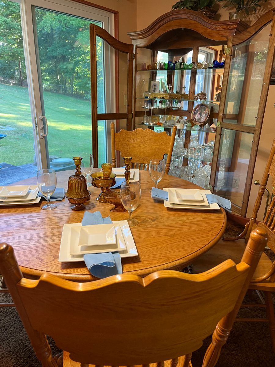 Oak pedestal dining table and pressback chairs