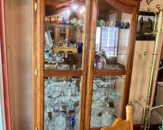 Oak lighted curio cabinet