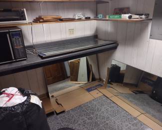 Wall mirrors with brackets and glass shelves to display. Kenmore microwave, toaster oven,  Queen featherbed mattress cover