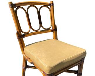 14 available - rattan chairs by McGuire. Rare, high end, vintage, vegan leather seats. 1960s. 
