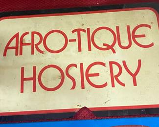 Small Plastic Afro-Tique Hosiery Sign