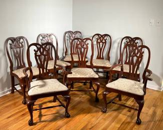 (8PC) WINTERTHUR MAHOGANY DINING CHAIRS | Distinctive back composed of interlacing C-scrolls resting on a pierced, vase-shaped back splat over curved cabriole legs raised on ball-and-claw feet. Including 2 armchairs and 6 side chairs. - l. 25 x w. 24 x h. 41 in (armchair)