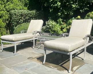 (3PC) BROWN JORDAN OUTDOOR LOUNGE SET | Including; 2 Brown Jordan chaise loungers with wheels and adjustable back, and Brown Jordan glass top coffee table. Original total retail price: $5000 - l. 80 x w. 31 x h. 46 in (chairs)