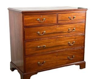 GEORGE III MAHOGANY CHEST OF DRAWERS | 18th century, fitted with two short over three graduated long drawers with brass handles on bracket feet. - l. 44.5 x w. 22.5 x h. 40.5 in