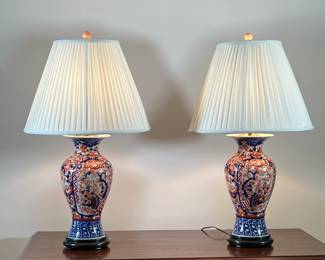 (2PC) IMARI PORCELAIN BALUSTER VASE LAMPS | Red and blue Imari baluster vases drilled and mounted as lamps on round wooden base. - h. 32 x dia. 18 in