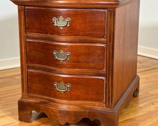 RIVERSIDE FURNITURE DIMINUTIVE CHEST | Diminutive chest with inlay 4 paneled top above 3 drawers with brass pulls raised on bracket feet. - l. 26 x w. 20 x h. 24 in