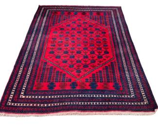 AFGHAN/BELOUCH CARPET | Worked with a stylized floral motif and five borders in shades of red, brown, navy blue, and white. -  l. 118 x w. 84 in